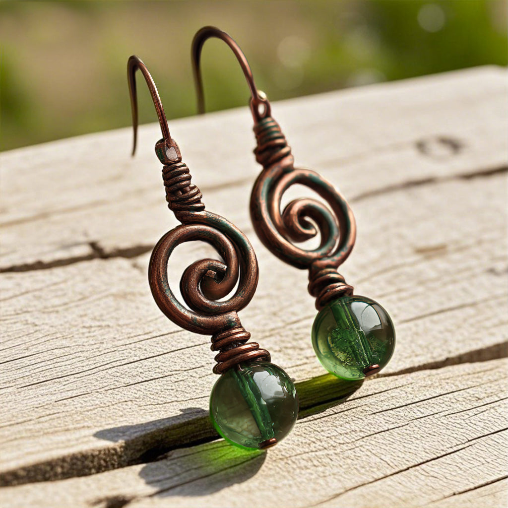 Handcrafted Copper Spiral Earrings with Green Glass Beads