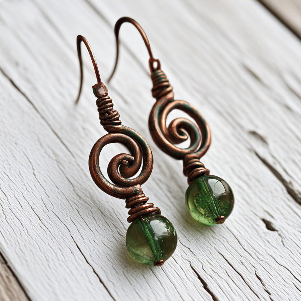 Handcrafted Copper Spiral Earrings with Green Glass Beads