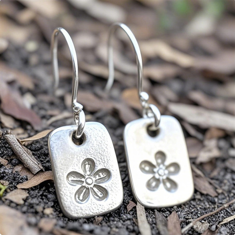 Minimalist Floral Drop Earrings – Hammered Silver with Engraved Flower Design