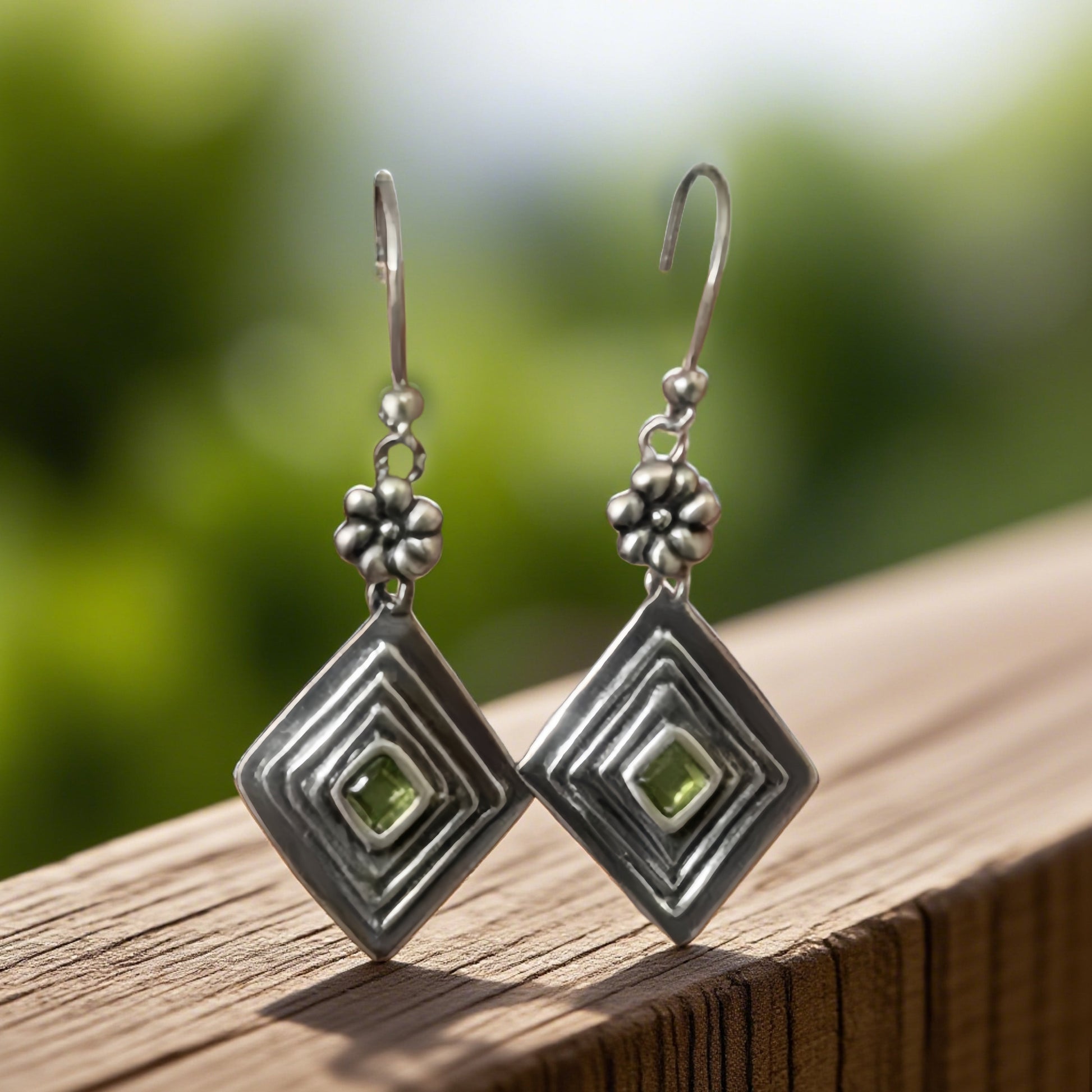 Elegant Silver Peridot Drop Earrings with Floral Design