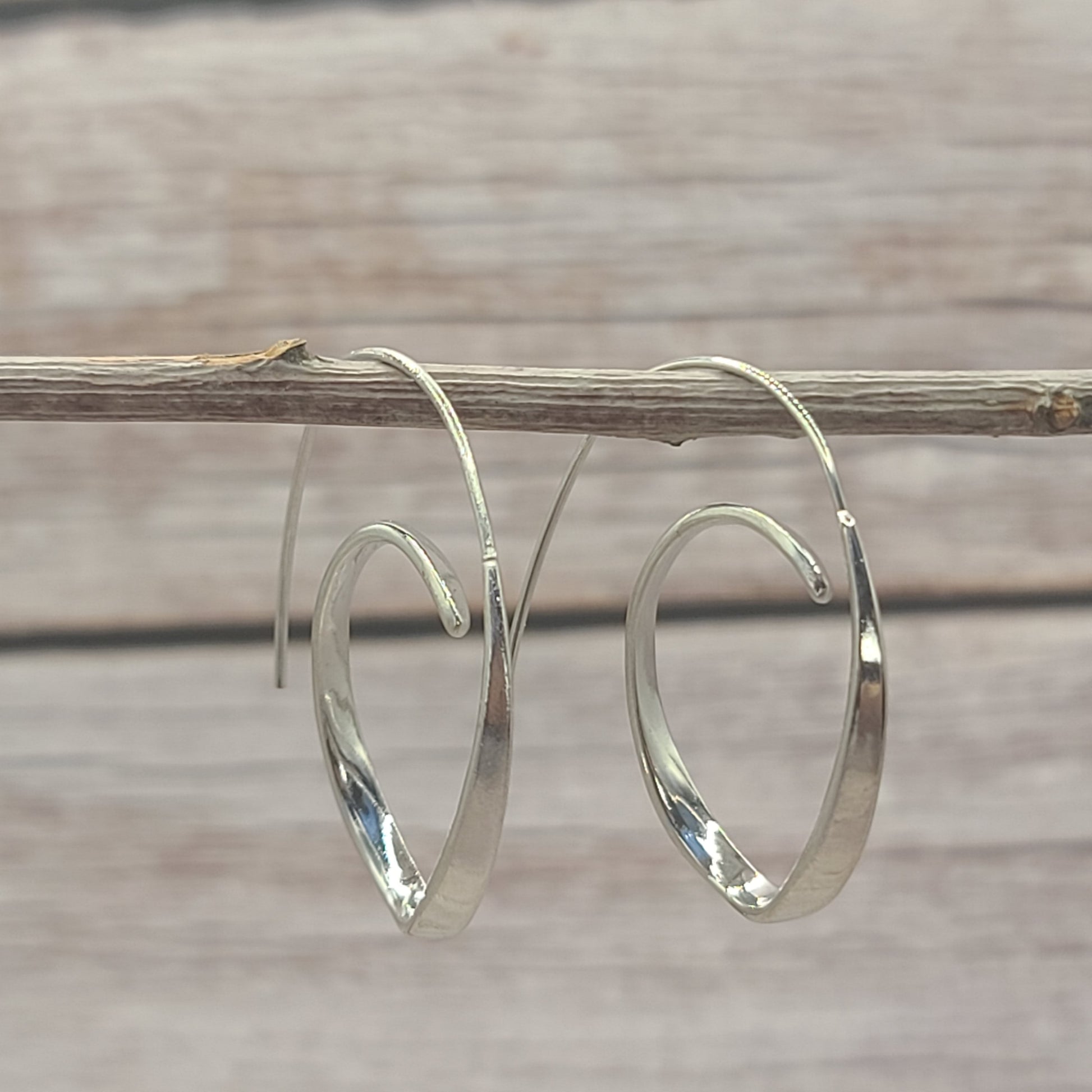Minimalist Twisted Hoop Earrings – Modern Sculptural Silver-Tone Statement Jewelry