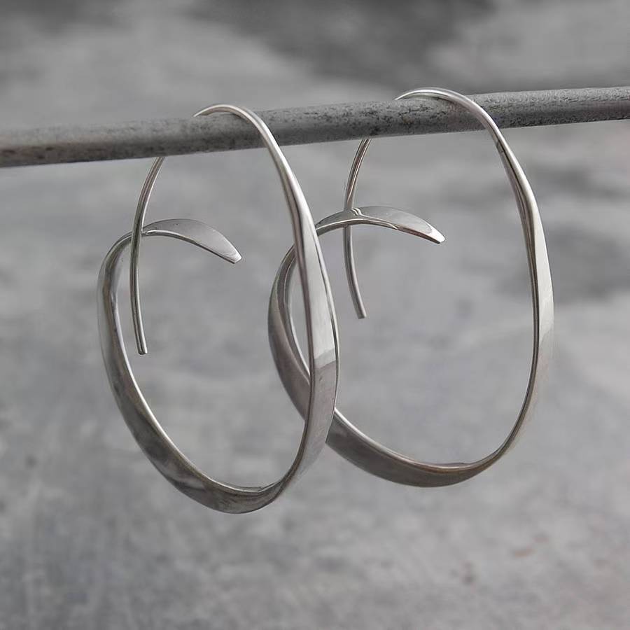 Minimalist Twisted Hoop Earrings – Modern Sculptural Silver-Tone Statement Jewelry