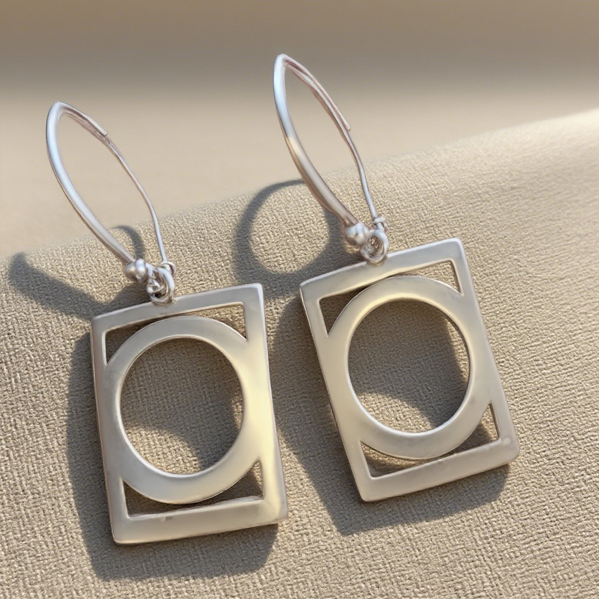 Modern Geometric Sterling Silver Earrings with Round Cutout Design