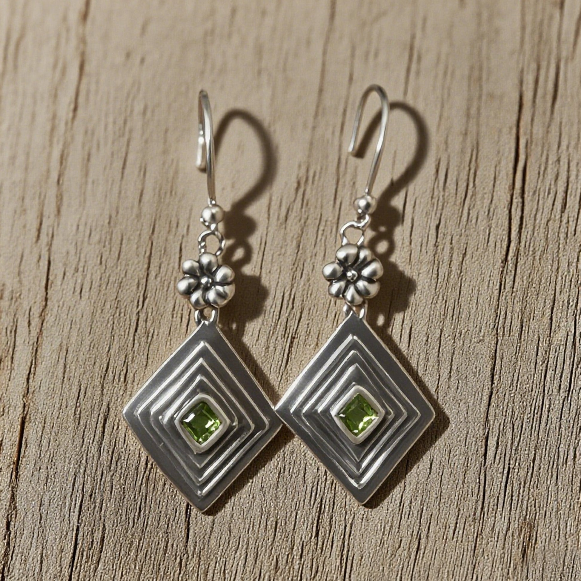 Elegant Silver Peridot Drop Earrings with Floral Design