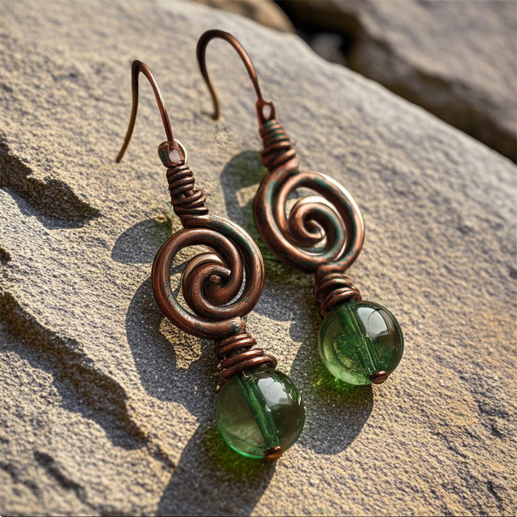 Handcrafted Copper Spiral Earrings with Green Glass Beads