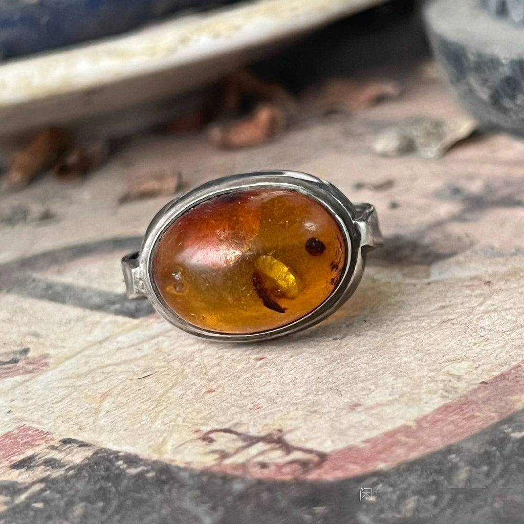 Handcrafted Sterling Silver Amber Ring – Unique Oval Design with Natural Amber Stone"