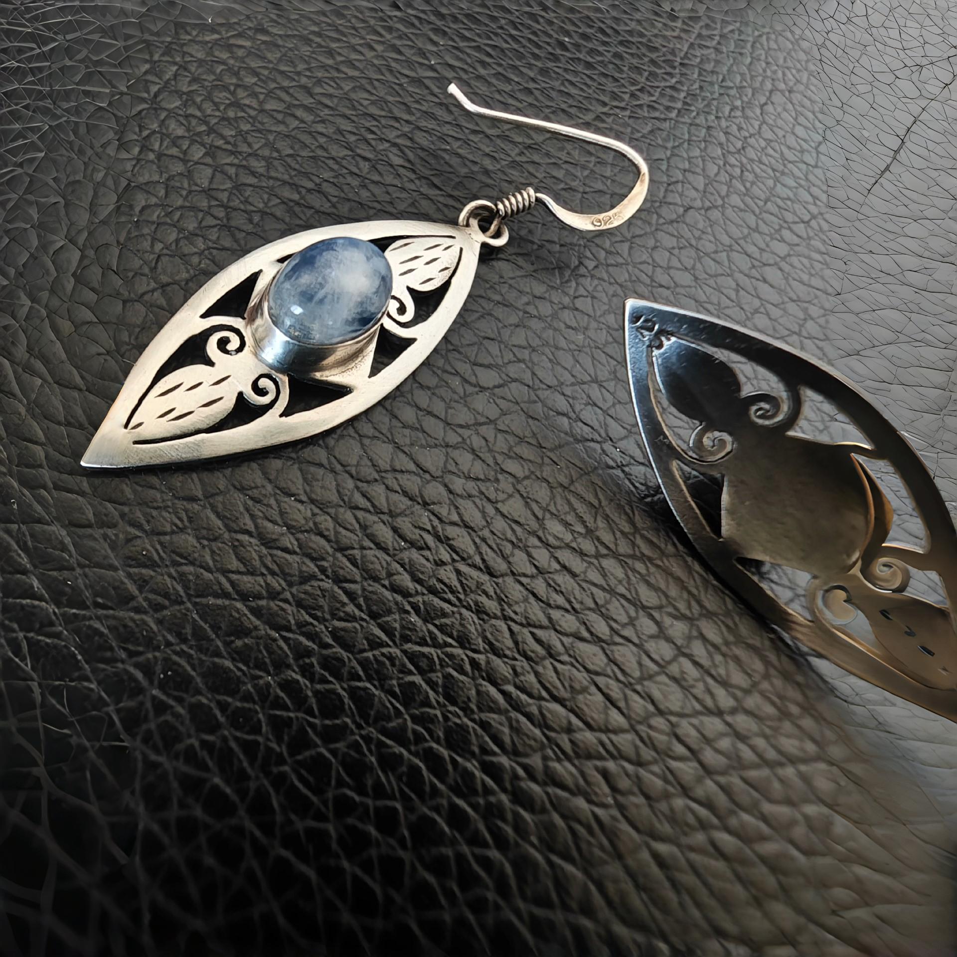 Hand-carved and inlaid moonstone earrings
