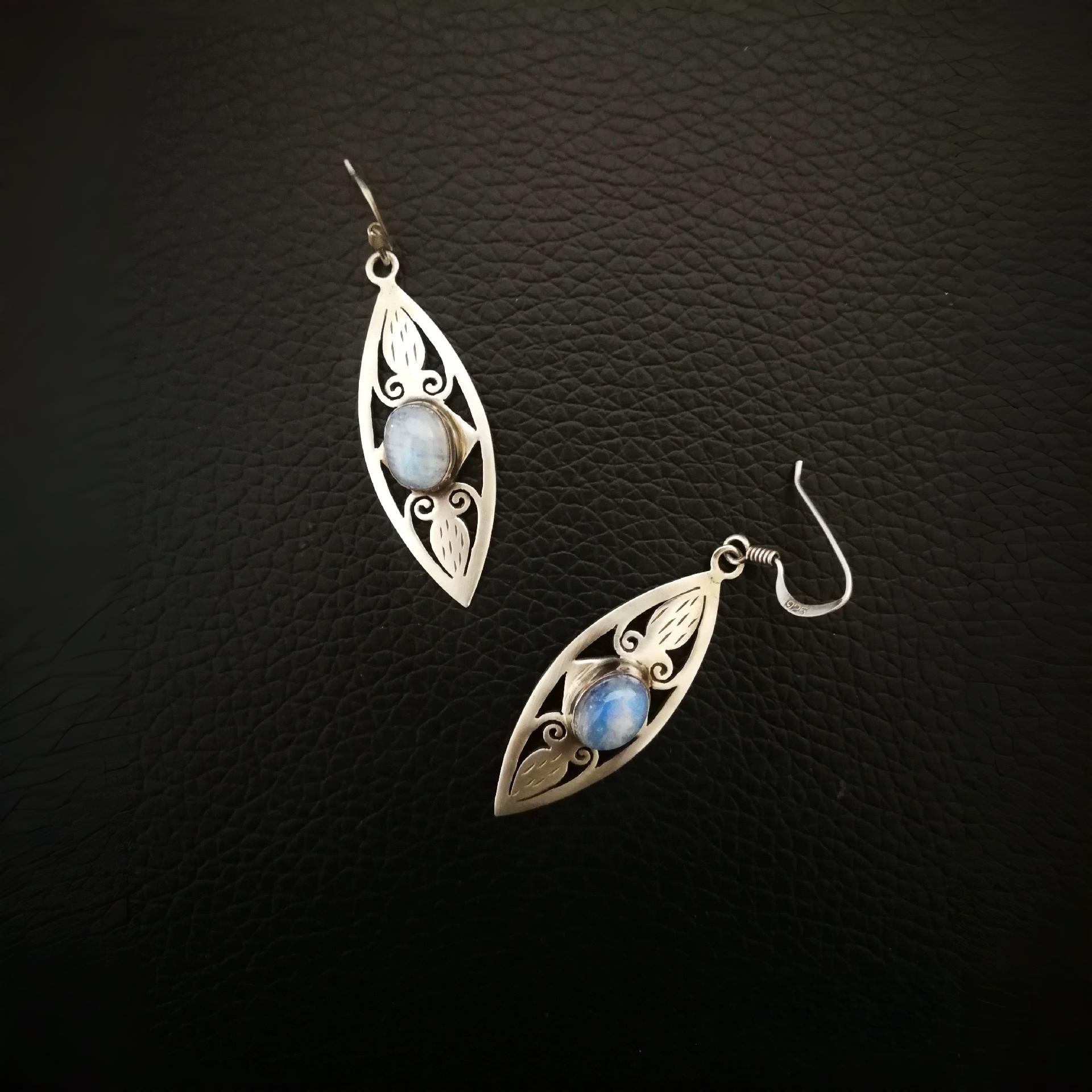 Hand-carved and inlaid moonstone earrings