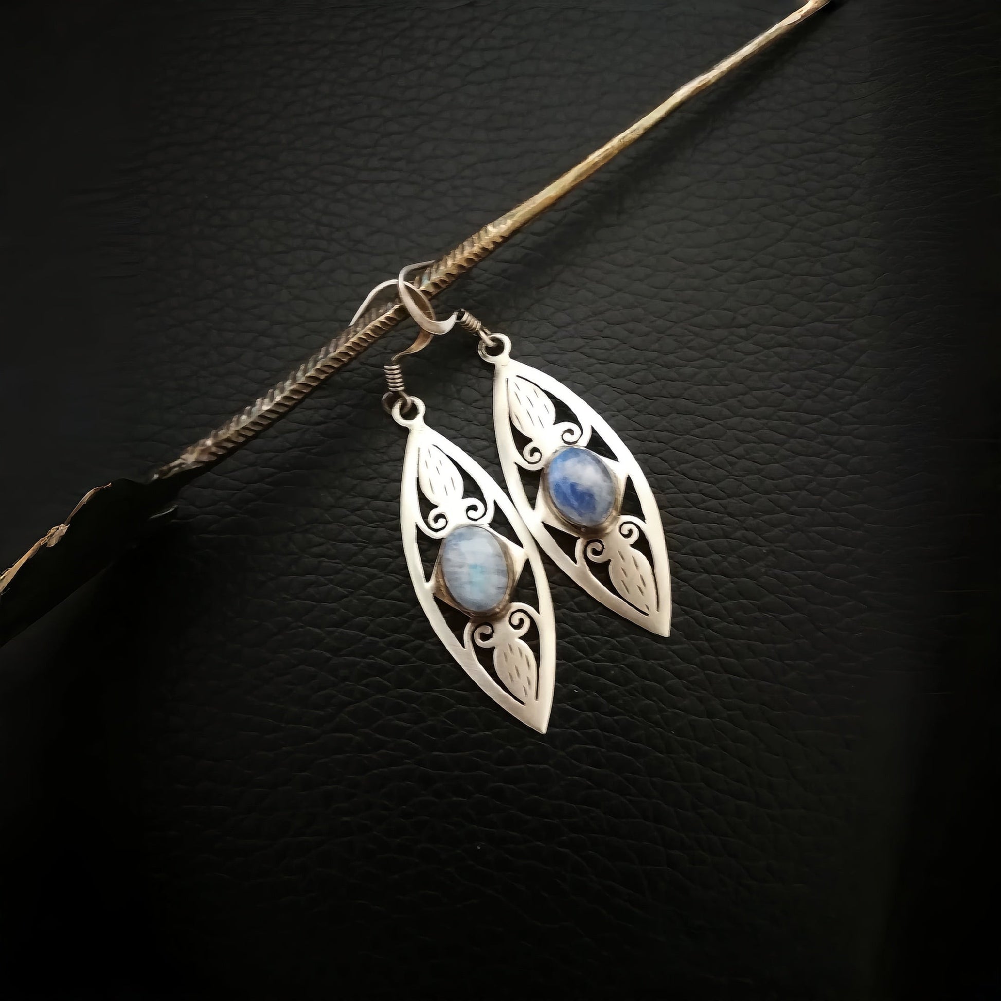 Hand-carved and inlaid moonstone earrings
